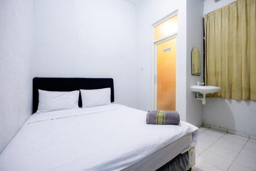 Marcello Residence Siwalankerto near Petra University Surabaya Mitra RedDoorz in Surabaya