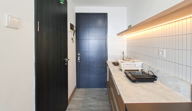 Modern Cozy Studio At Apartment Collins Boulevard in Tangerang