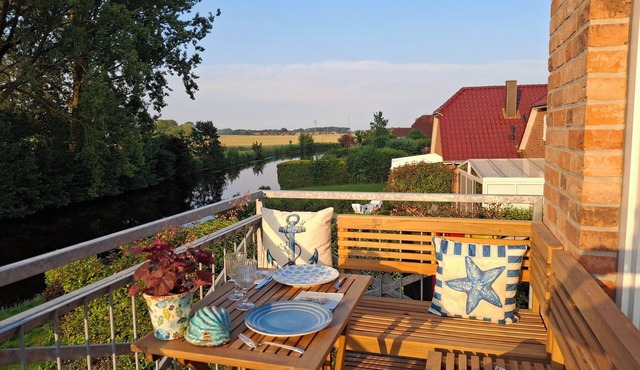 Neue 80qm Ferienwohnung für 4 Pers. + 2 Hunde mit Kamin, Balkon & Wasserblick in Eilsum