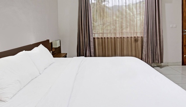 OYO 91696 Kimara Homestay & Resto
