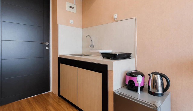 Restful Snug Studio Room At Apartment Suncity Residence in Sidoarjo