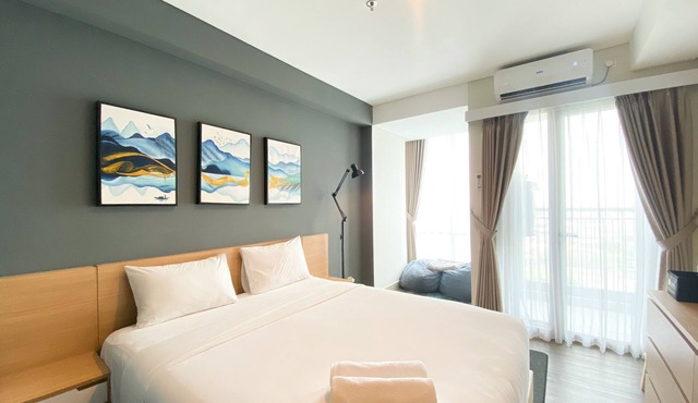 Simply Look And Warm Studio Room Tamansari Iswara Apartment in Bekasi