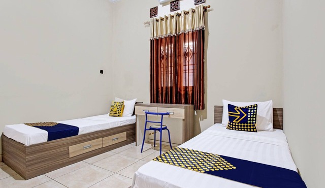 SPOT ON 92424 Wulan Homestay Syariah