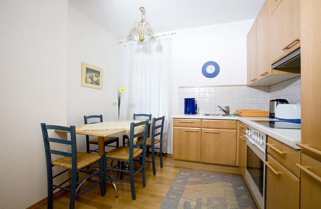 Bright Holiday Apartment “Ferienwohnung Bregenz 8 Top 1” in Central Location Close to Lake Constance with Wi-Fi, Terrace & Garden in Bregenz