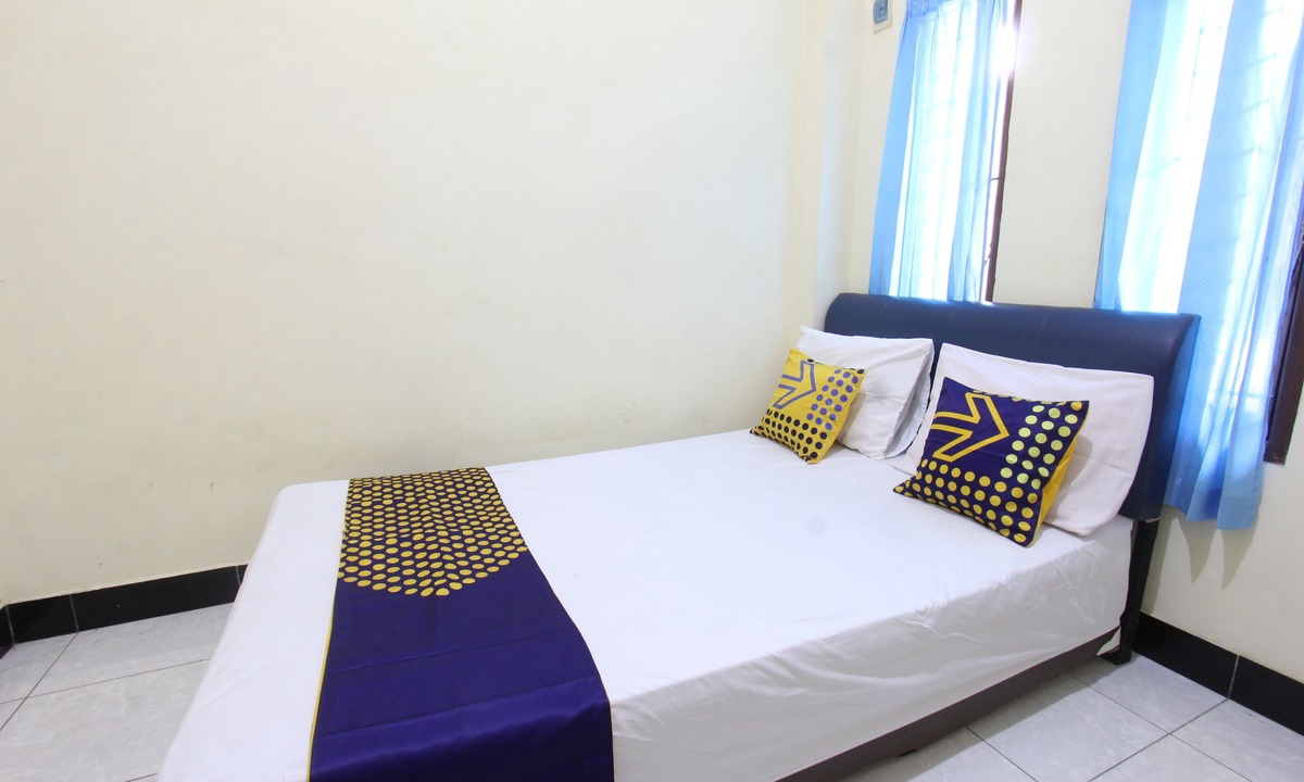 Muncan Hotel | OYO Life 93157 Kos Kaloka