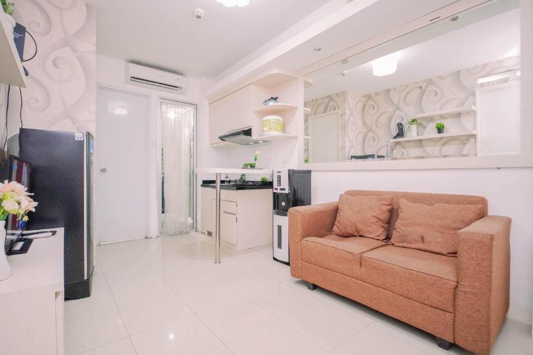 Jatinegara Apartment | Exquisite 2BR Bassura City Apartment near Shopping Mall By Travelio
