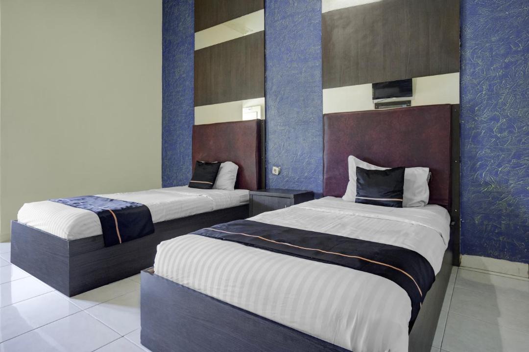 Palembang Hotel | Hotel O near Universitas Widya Dharma formerly Nugraha Residence
