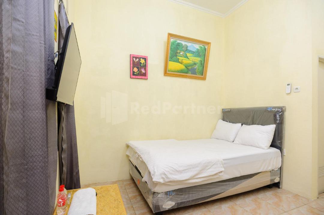 Depok Hotel | Fajar Inn Mitra RedDoorz