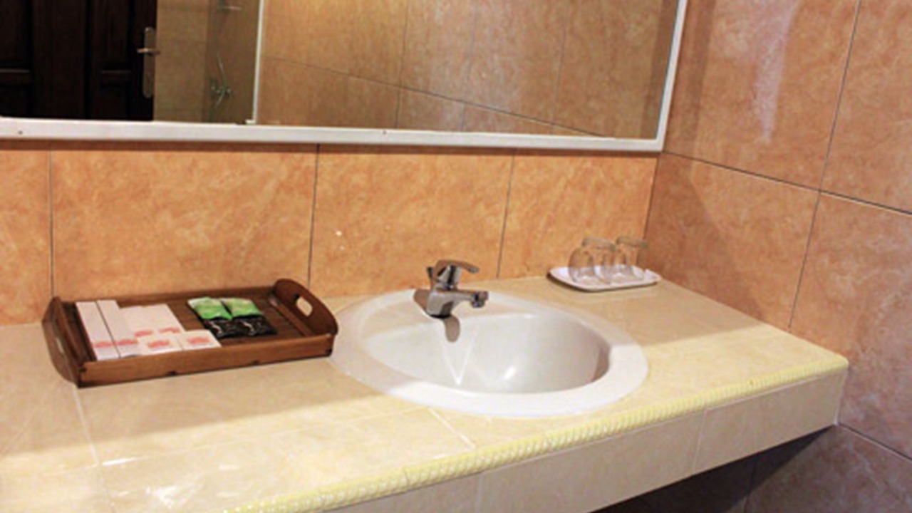Photo of Bathroom in Kartika Plaza