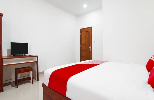 Dumai Hotel | OYO 91301 Lewis Dc Guesthouse