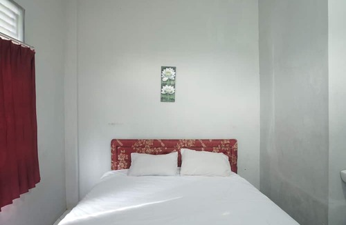 Melayu Hotel | Hotel O Losmen Arkansas Syariah