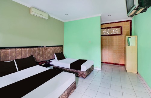 Cokroaminto Hotel | Collection O Bali near Terminal Ubung formerly Batukaru Garden Hotel