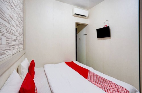 Surabaya Hotel | OYO Life 90606 Glass House Citraland Syariah