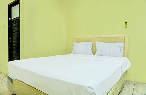 South Ogan Komering Ulu Hotel | Capital O 92316 Wisma Widya Loka Pratama Near Futsal Tebing Gading
