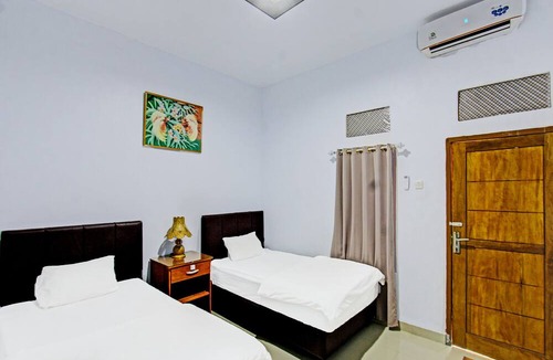 Labuhan Pandan Hotel | OYO 91965 Swan Homestay