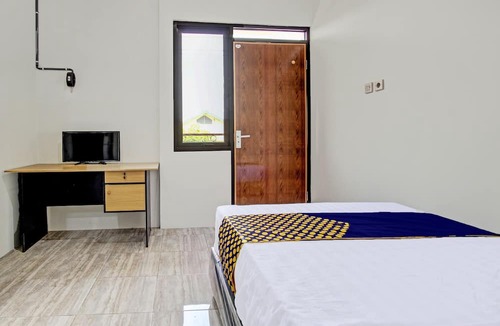 Pati Hotel | Hotel O Kristin Homestay