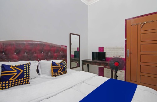 Pekanbaru Hotel | Hotel O Putri Guest House Syariah Near SPBU Rimbo Panjang