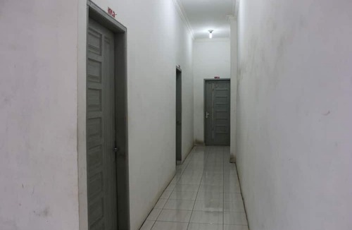 Medan House | Penginapan Transit Tomato