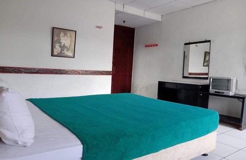 Berastagi Hotel | OYO 2322 Dien Karona Hotel