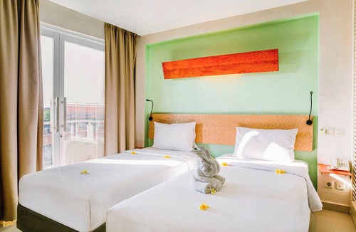 Raya Kuta Hotel | HARRIS Hotel & Residence Riverview Kuta Bali
