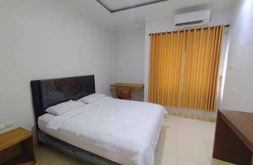 Makassar Hotel | Hotel O near Primaya Hospital formerly