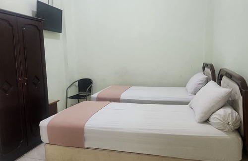 Makassar Hotel | Hotel O near Primaya Hospital formerly