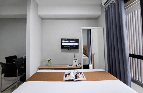 South Tangerang Apartment | Classic And Homey Gray Studio At Apartment The Ayoma