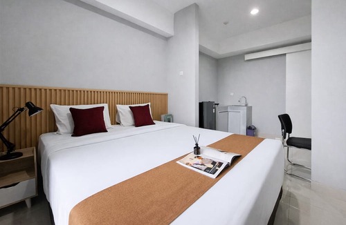 South Tangerang Apartment | Classic And Homey Gray Studio At Apartment The Ayoma