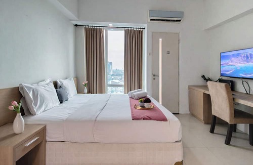 Siwalankerto Apartment | Cozy Living Studio At The Square Surabaya Apartment