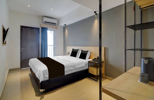 Bendungan Hilir Hotel | Collection O near Stadion Utama Gelora