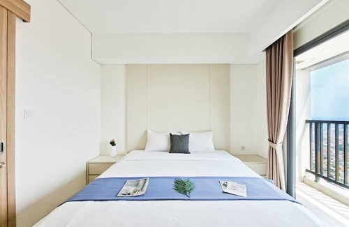 Pondok Aren Apartment | Wooden Accents 1Br Without Living Room At Bintaro Embarcadero Apartment