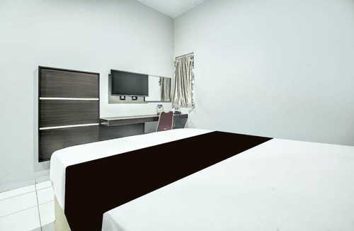 Panakkukang Hotel | Hotel O Makassar near Mall Panakukang formerly Hotel Lucky Inn Makassar