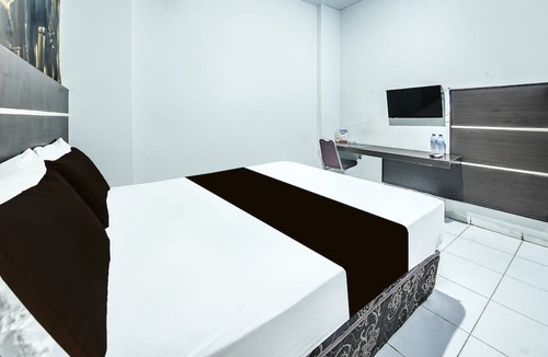 Panakkukang Hotel | Hotel O Makassar near Mall Panakukang formerly Hotel Lucky Inn Makassar