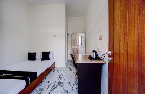 Dinoyo Hotel | OYO 94766 Tapak Liman Syariah