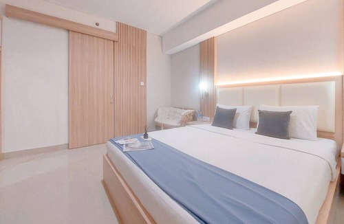 Pondok Aren Apartment | Modern Look 1Br Without Living Room At Bintaro Embarcadero Apartment
