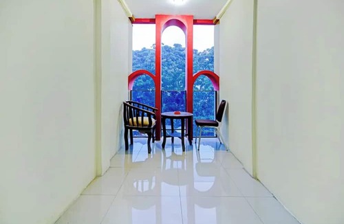 Parapat Hotel | Hotel Toba Shanda By Helocus