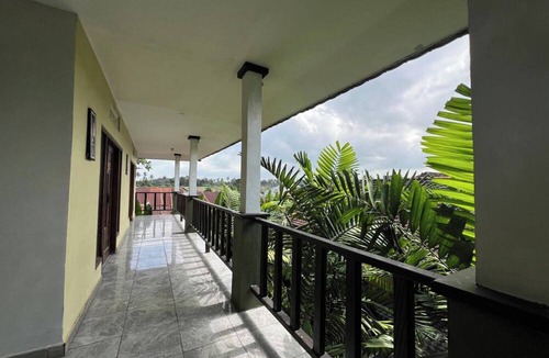 Mengwi Hotel | OYO 94014 The Sanya Homestay