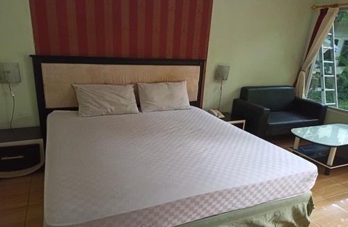 Sei Pinang Hotel | Hotel O Wisma Flamboyan NearTaman Makam Pahlawan