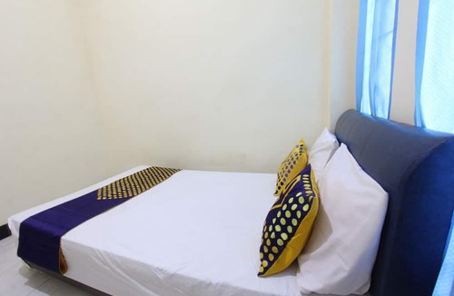 Muncan Hotel | OYO Life 93157 Kos Kaloka