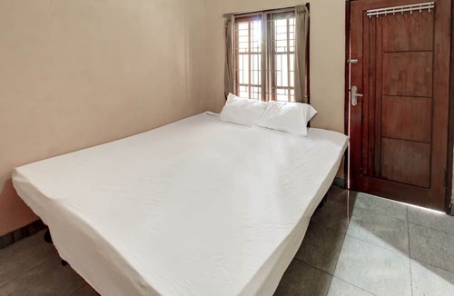 Muncan House | OYO Life 92846 Kost Putra Griya Eka
