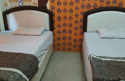 Banjarmasin Hotel | Hotel O Wisma Hamalau SyariahNearPulau Bromo Pedestrian Bridge