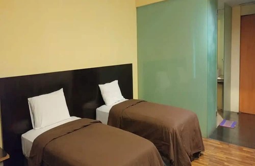 Manado City Centre Hotel | Cozzy Hotel Quint