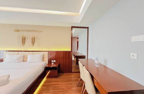 Ngaglik Apartment | Classic Wooden Touch Studio Room At Apartment Mataram City