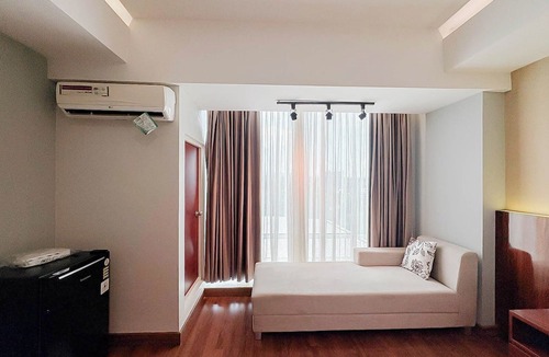Ngaglik Apartment | Classic Wooden Touch Studio Room At Apartment Mataram City