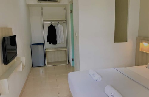 Bendungan Hilir Hotel | LeGreen Suite Tondano