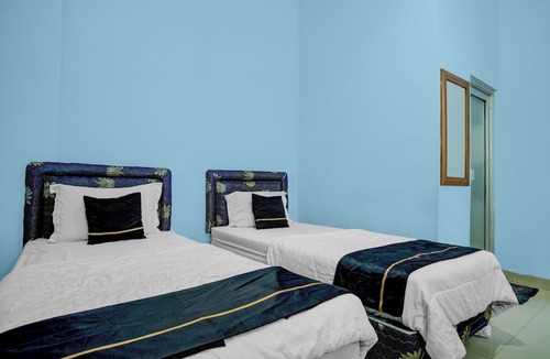 Palembang Hotel | Hotel O near Palembang Square Mall formerly Wisma Faeyza Syakira