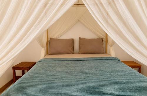 Rua Hotel | the village rua beach homestay