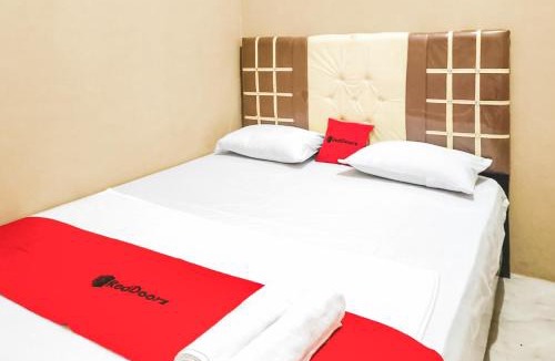Perbaugan House | RedDoorz near Pantai Indah Sialang Buah