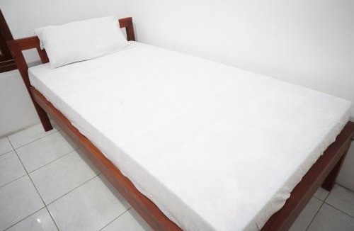Dinoyo Hotel | OYO 95348 Kost Baituna Syariah