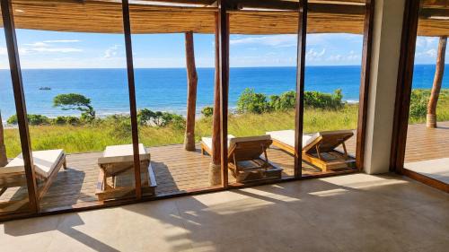 Mamboro Apartment | Beach Padel and Pool Villa Profits to Charity